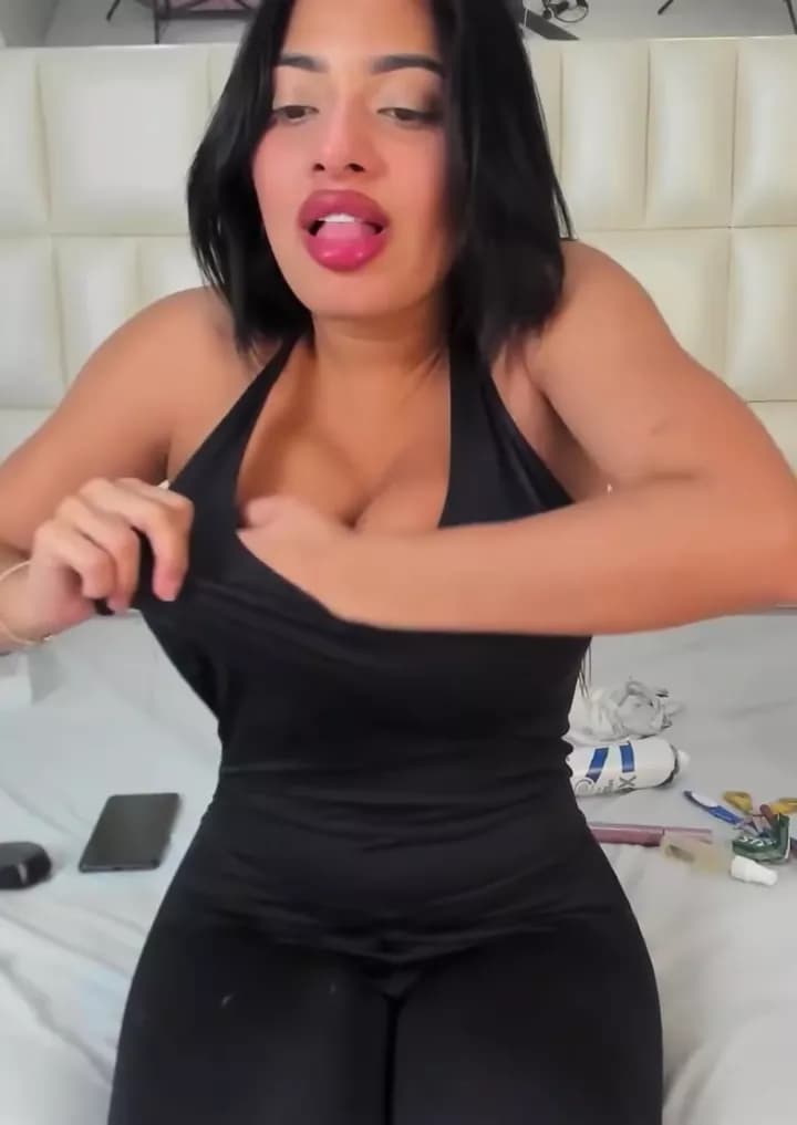 Latina in Black Bodysuit Pulls Out Her Massive Tits